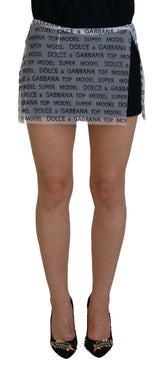 Dolce & Gabbana White Logo See Through A-line Mini Skirt -   -  Dolce & Gabbana.